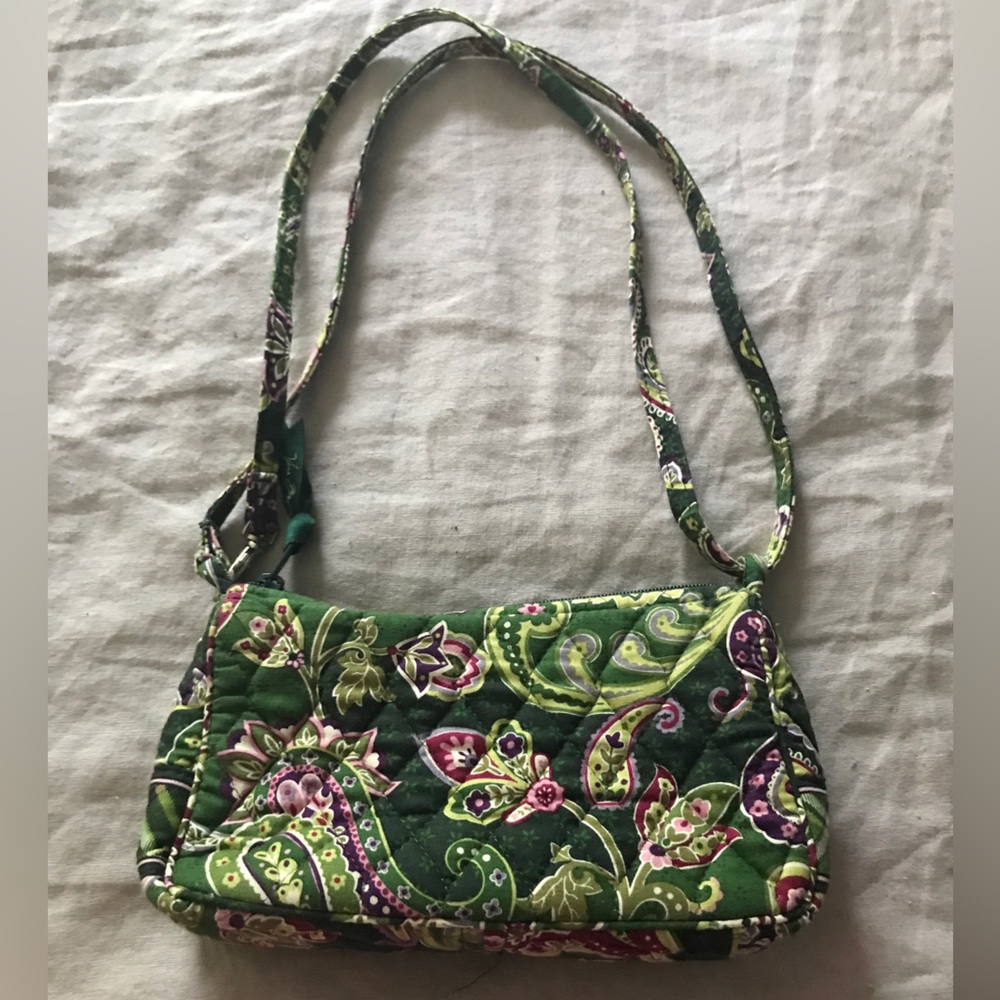 Vera Bradley small handbag with adjustable strap.